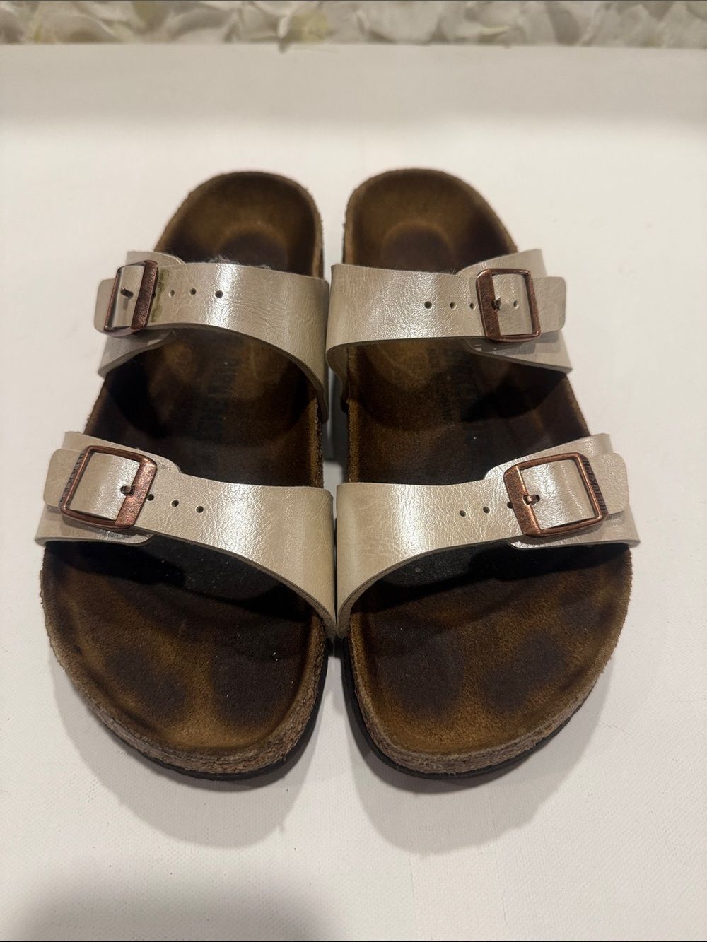 Birkenstock Two-Strap Sandals in Light Beige with Rose-Gold Buckles